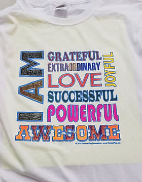 I Am Awesome Workshop Tee Shirt image in brown, orange and pink